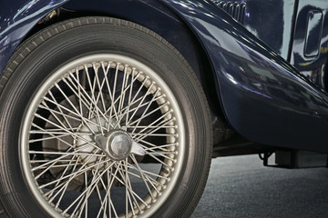 Old style Classic Car wheel and tire.