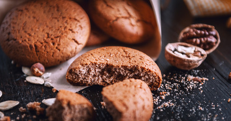 cookies with milk on a wooden table