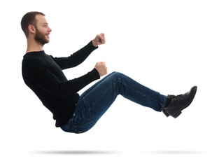 man drives an imaginary car