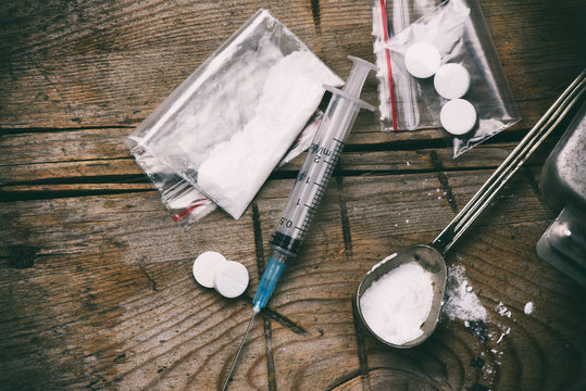 Drug, syringe and heroin
