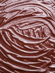 Melted chocolate or chocolate glaze.