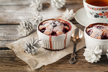 Two cake with berry on wooden background