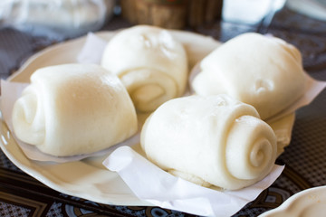Steamed bun on dish