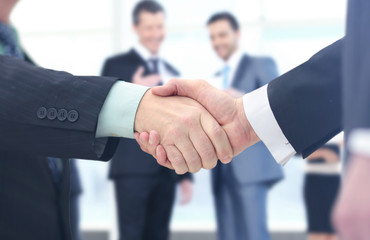 Concept of partnership - handshake  business partners