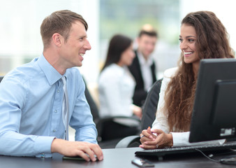 beautiful woman-Manager communicates with the client in the work