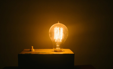 A warm yellow glare of bulb.