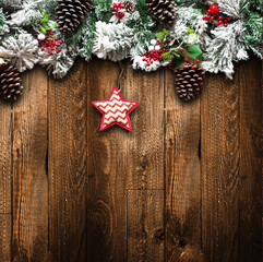 Merry Christmas Frame with green pine, colorful baubles and stars