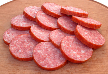 Sliced pieces of smoked salami sausage