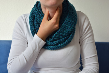 Woman having a sore throat