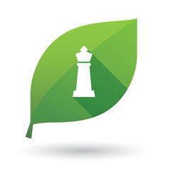 Isolated green leaf with a  king   chess figure