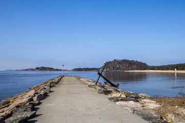 Fototapeta na wymiar Landscape Scandinavian nature, the rocky shore of the lake, blue sky