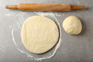 Pizza dough and rolling pin