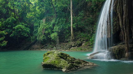 Fototapeta na wymiar Wonderful green nature with green waterfall, Erawan's waterfall located Kanchanaburi Province, Thailand
