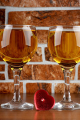 Glass and bottle wine on wooden table