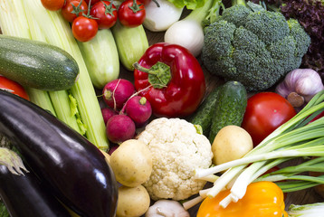 Background of fresh vegetables and greens closeup