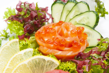 Japanese cuisine sashimi with vegetables and fish in a restaurant