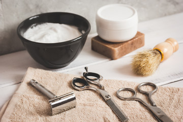 Mens hairdressing wooden desktop with tools for shaving