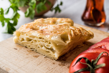 Su Boregi / Turkish Patty with tomatoes and greens.