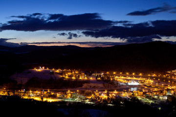 Zimowa panorama w Muszynie w górach. Night landscape of the mountain in Muszyna - Poland. Polish mountain landscape © rogozinski