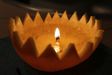 Fototapeta premium Orange peel candle with oil