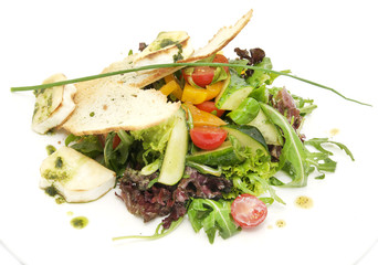 Salad of meat cheese and vegetables in a restaurant
