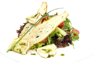 Salad of meat cheese and vegetables in a restaurant