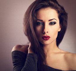 Beautiful makeup sexy woman with hot red lipstick and long eye l