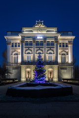 Christmas tree in front of old library of Warsaw Univeristy. Warsaw, Poland - 131128180