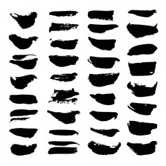 Abstract textured strokes black paint set isolated on a white ba