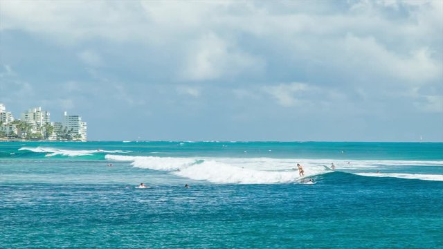 Waikiki Beach Following Surfers Close-up in Honolulu Hawaii Surfing Big Waves at the Popular Destination