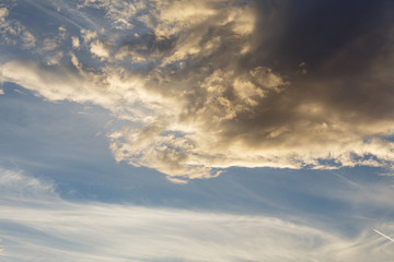 Cumulus clouds against a blue sky. Partly Cloudy. Anticyclone. Weather forecast.