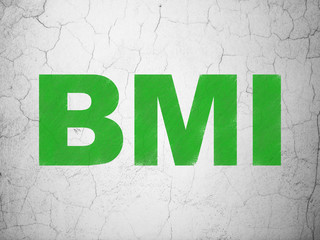 Health concept: BMI on wall background