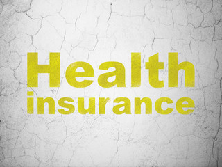 Insurance concept: Health Insurance on wall background