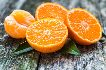 Fresh mandarin oranges fruit on wooden table