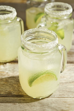 Lemon and limeade in jars 