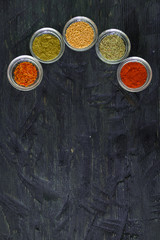 Various spices and herbs on white background.