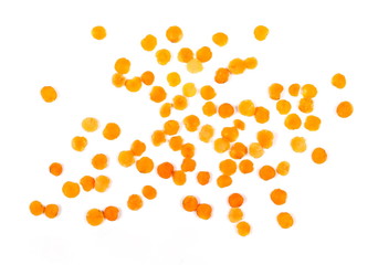 pile red lentils isolated on white background and texture