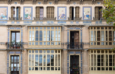 facade of the building with a mosaic pattern