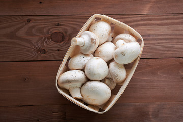 mushrooms on a wooden table top