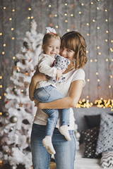 Little girl sits in the arms of his mother 7172.