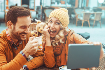Happy couple taking a selfie