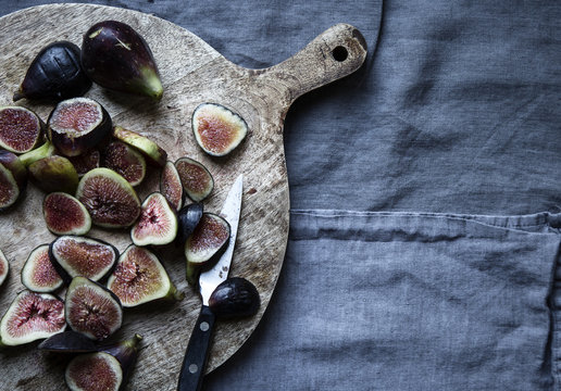 Close up of figs on wooden board