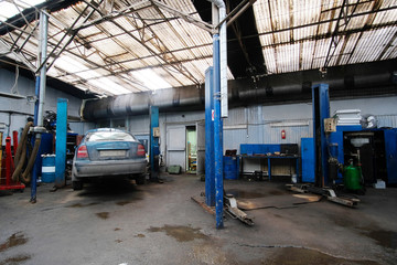 Fototapeta na wymiar Car in a car repair station