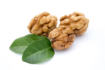 Walnut and walnut kernel isolated on the white background.