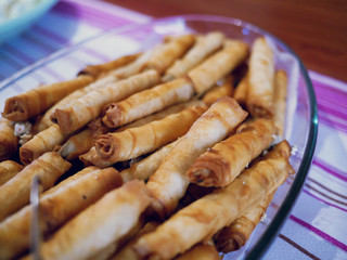 Crispy cheese spring rolls  in dish