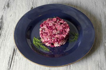 Beetroot salad with chicken, green peas, carrots, onions and yoghurt dressing with olive oil