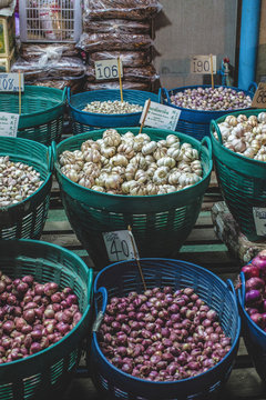 Garlic and onion in baskets 