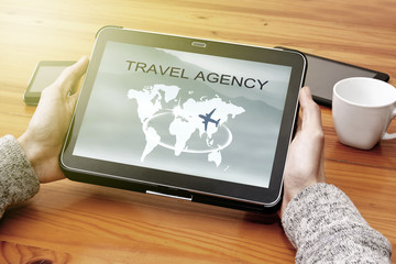 hands of young by consulting the agency's travel in internet