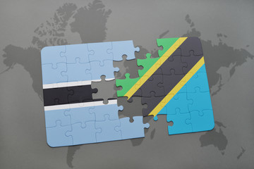 puzzle with the national flag of botswana and tanzania on a world map