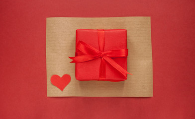 red gift box on paper background